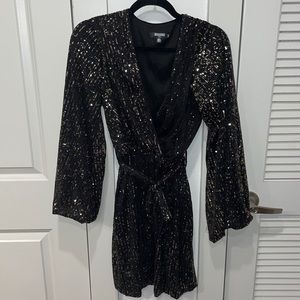 Black and gold sequin dress